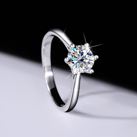 Angled side view of the six-prong round moissanite ring