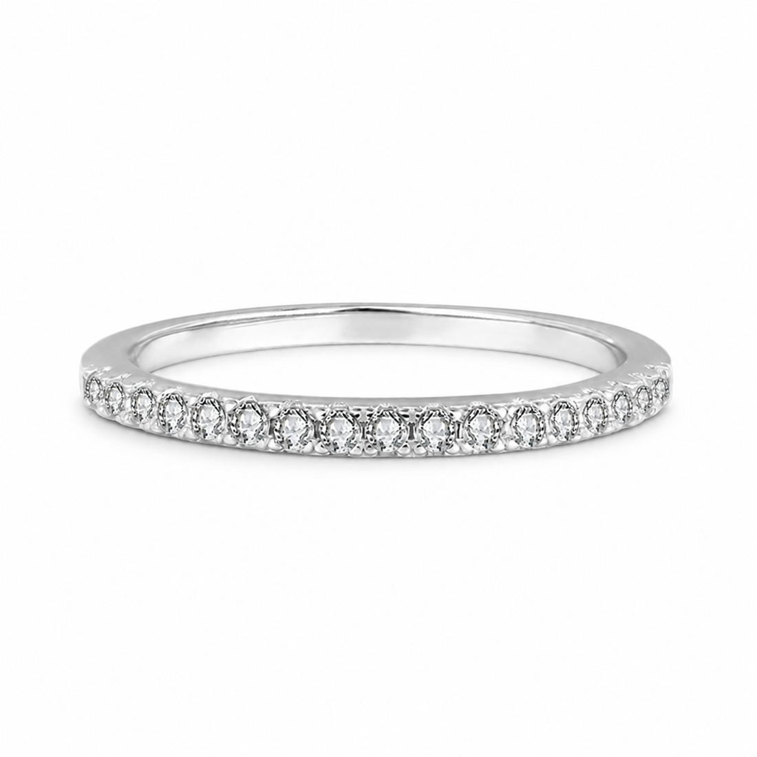 Slim straight pave moissanite wedding band in polished silver
