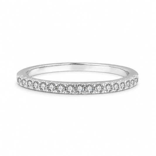 Slim straight pave moissanite wedding band in polished silver