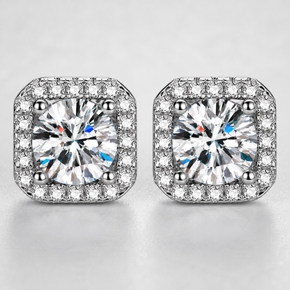 Macro detail of round center stones and square halo settings