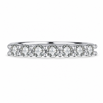 Seven-stone round moissanite wedding band in polished silver