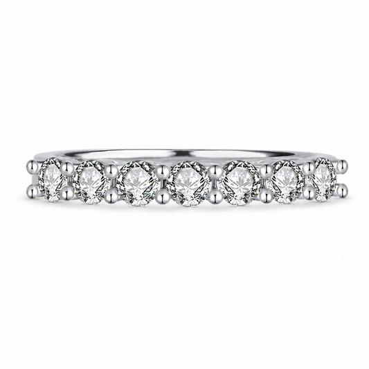 Seven-stone round moissanite wedding band in polished silver