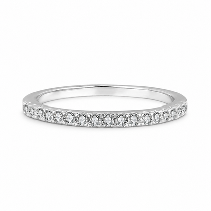 Slim straight pave moissanite wedding band in polished silver