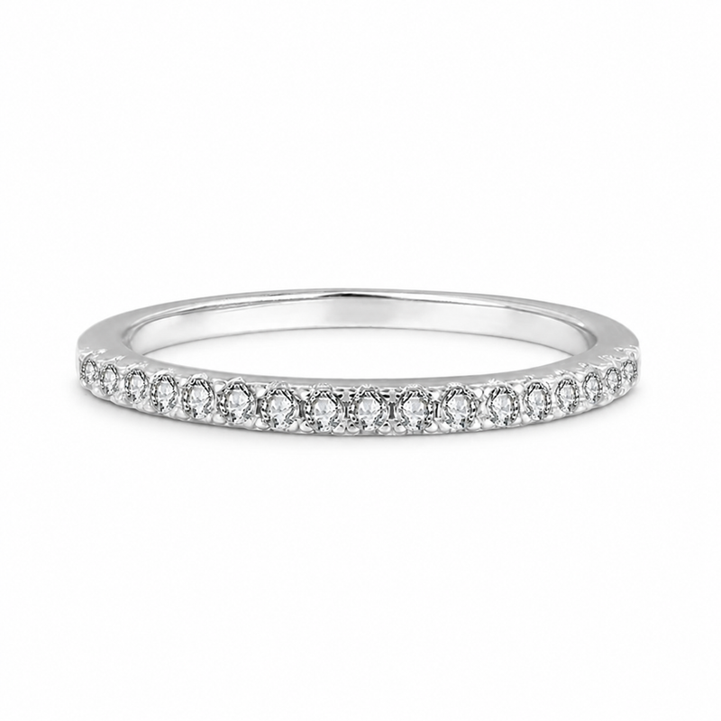 Slim straight pave moissanite wedding band in polished silver