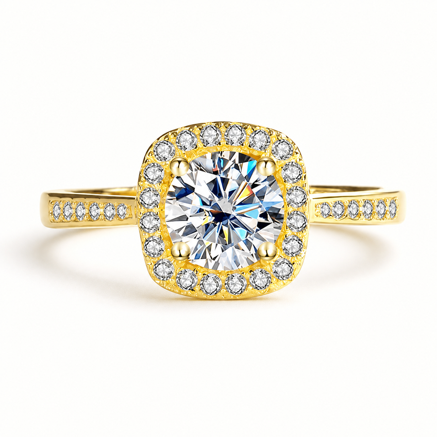Front view of a yellow gold tone square halo round moissanite ring