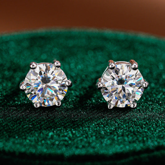 Pair of round moissanite stud earrings in six-prong S925 silver settings