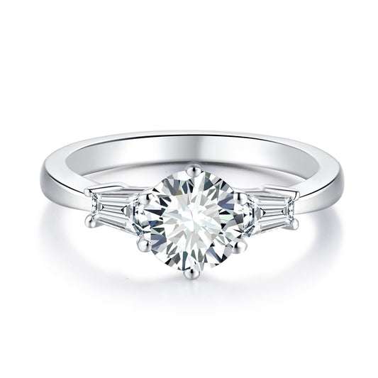 Six-prong round moissanite ring with tapered baguette side stones in silver