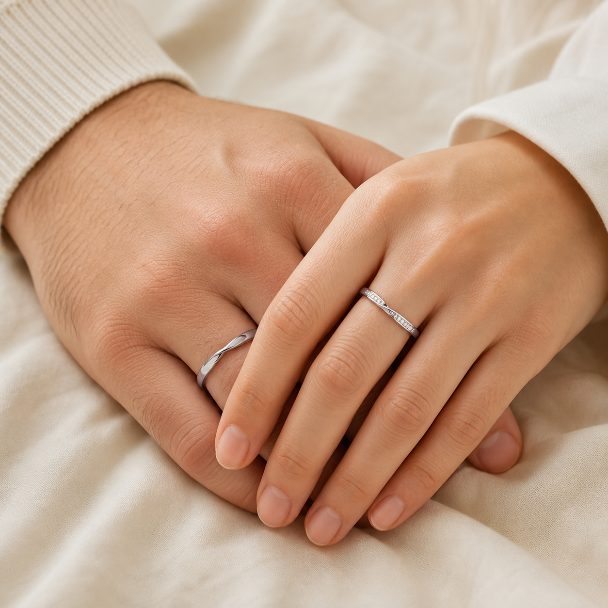 Gallery 2026 · Twist couple bands worn by two partners