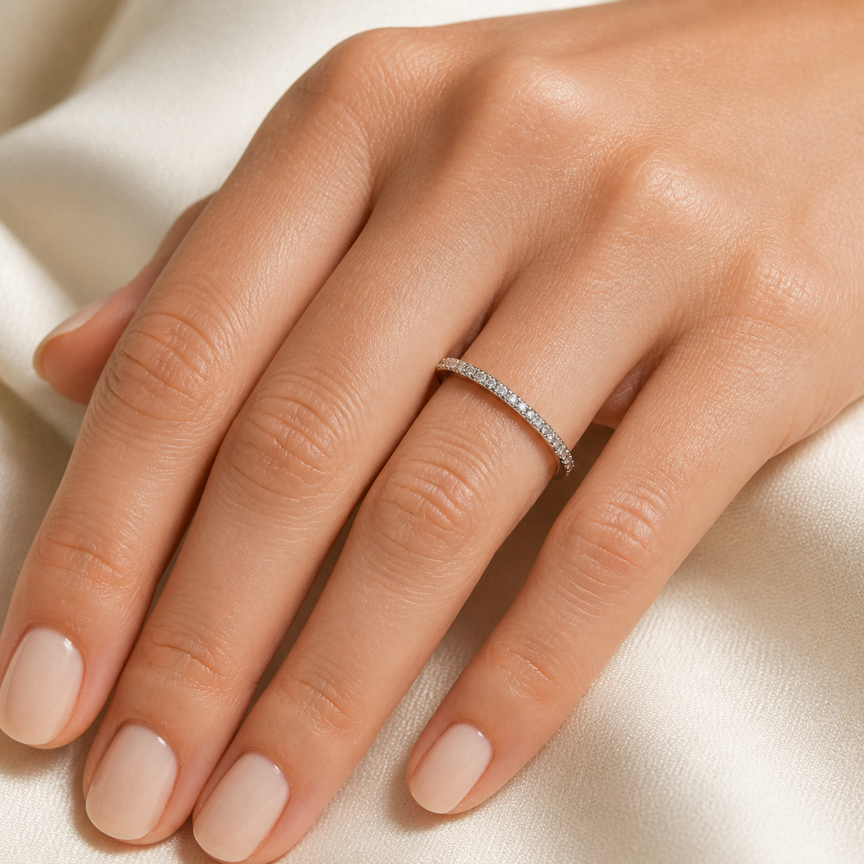 Gallery 2026 · Slim pavé moissanite band worn on hand