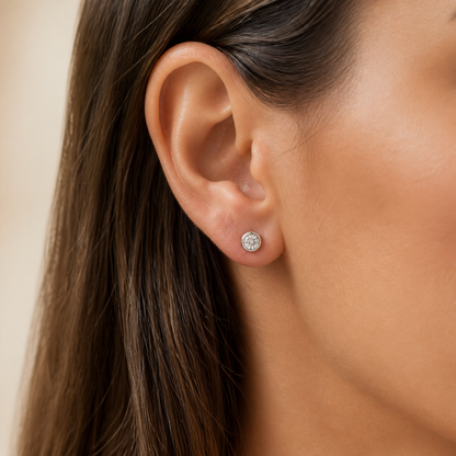 Gallery 2026 · Bezel round moissanite stud worn on ear